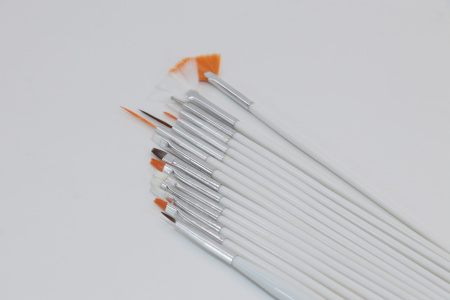 Set of 15 brushes for painting, white